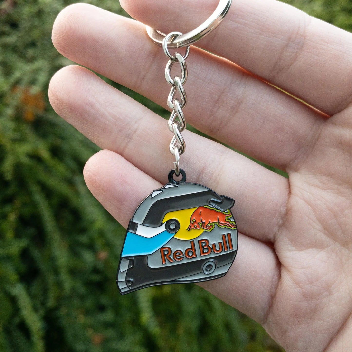 Sergio Perez 2022 Monaco Special Edition Helmet Enamel Keychain shown in hand