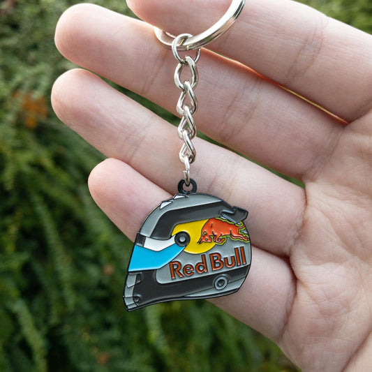 Sergio Perez 2022 Monaco Special Edition Helmet Enamel Keychain shown in hand