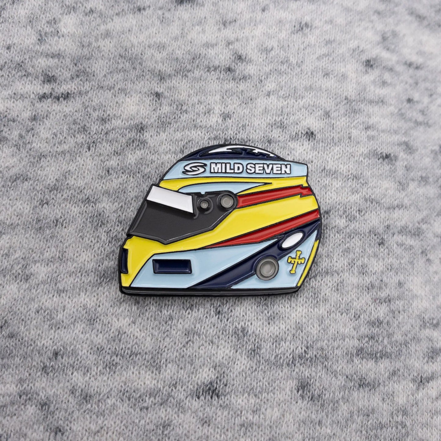 Fernando Alonso 2006 Helmet Enamel Pin shown on grey fabric