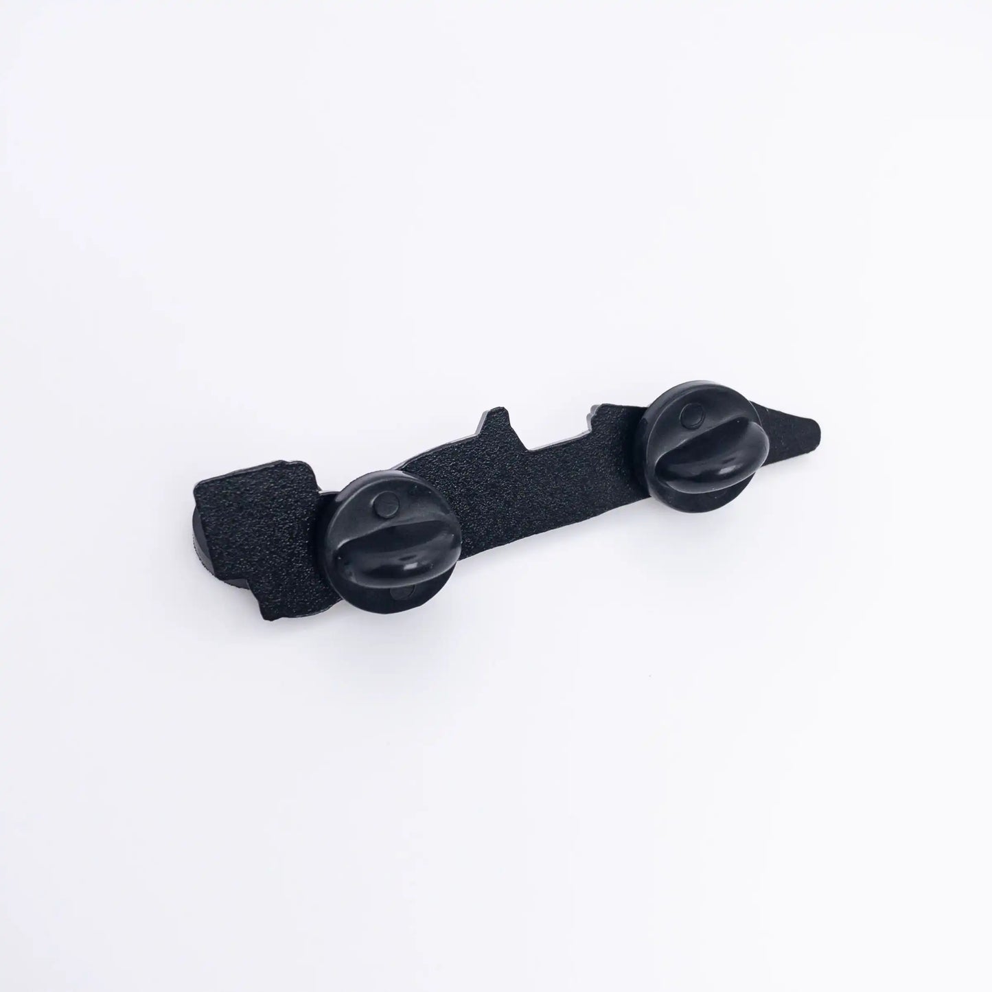 Back of McLaren MP4/4 Formula One Car Enamel Pin, dyed black with two rubber clutches