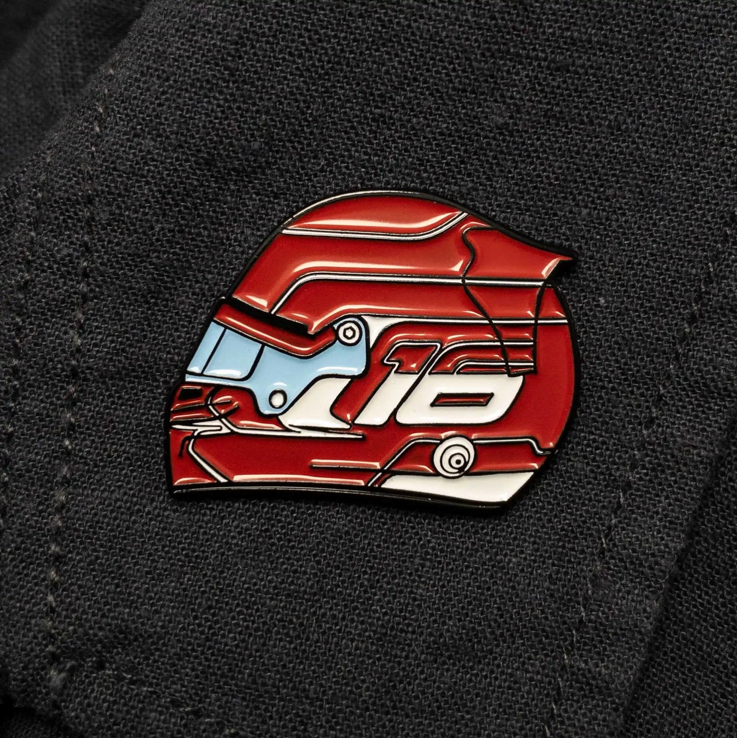 Charles Leclerc 2023 Helmet Enamel Pin shown on cloths