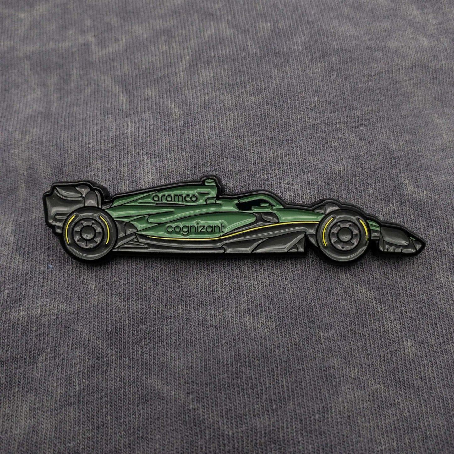 Aston Martin AMR23 Formula One Car Enamel Pin shown on clothes