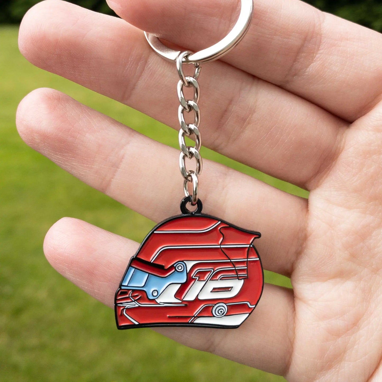 Charles Leclerc 2023 Helmet Enamel Keychain shown on hand