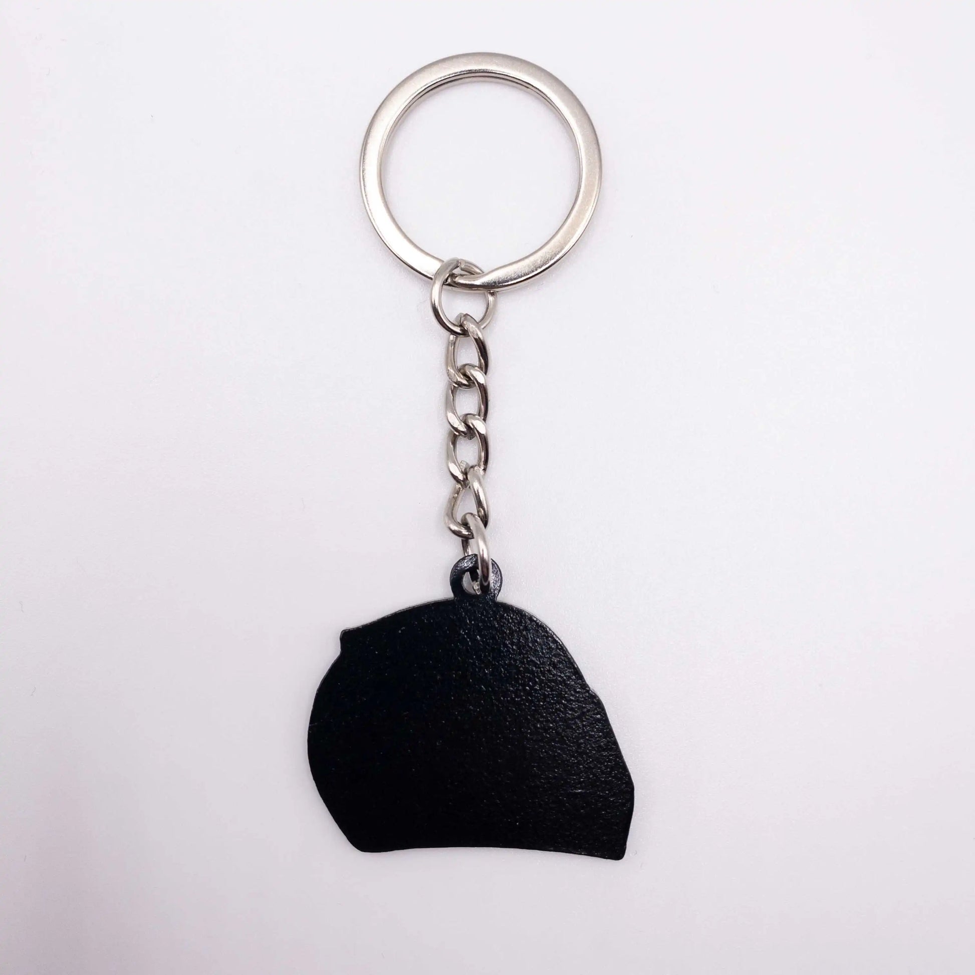 Back of Lewis Hamilton 2023 Helmet Enamel Keychain shown on white background