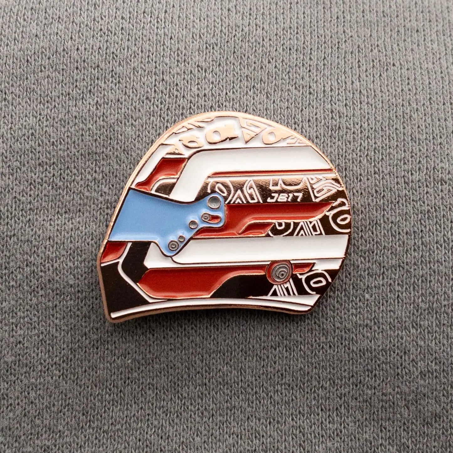 Pierre Gasly 2023 Helmet Enamel Pin shown on grey clothes