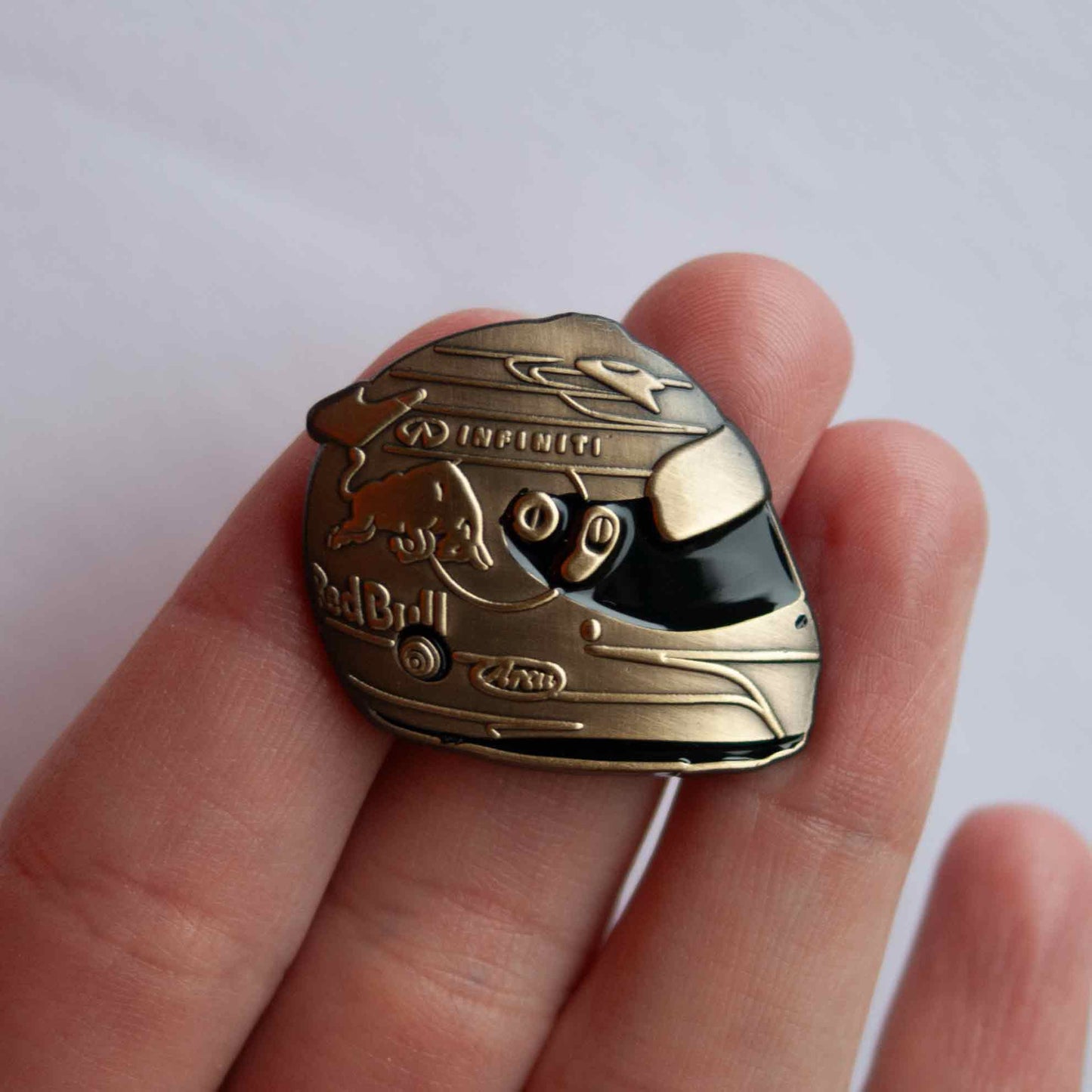 Sebastian Vettel 2014 Monaco Special Edition Helmet Die-Cast Pin shown on hand