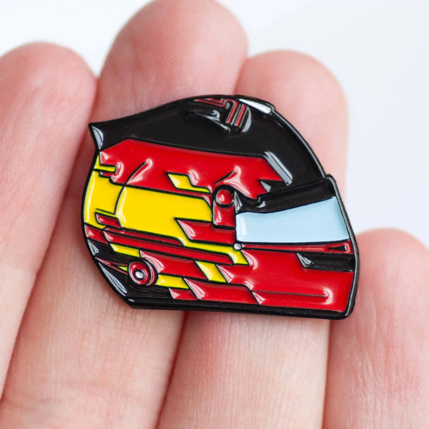 Carlos Sainz 2024 Helmet Enamel Pin Badge shown on hand