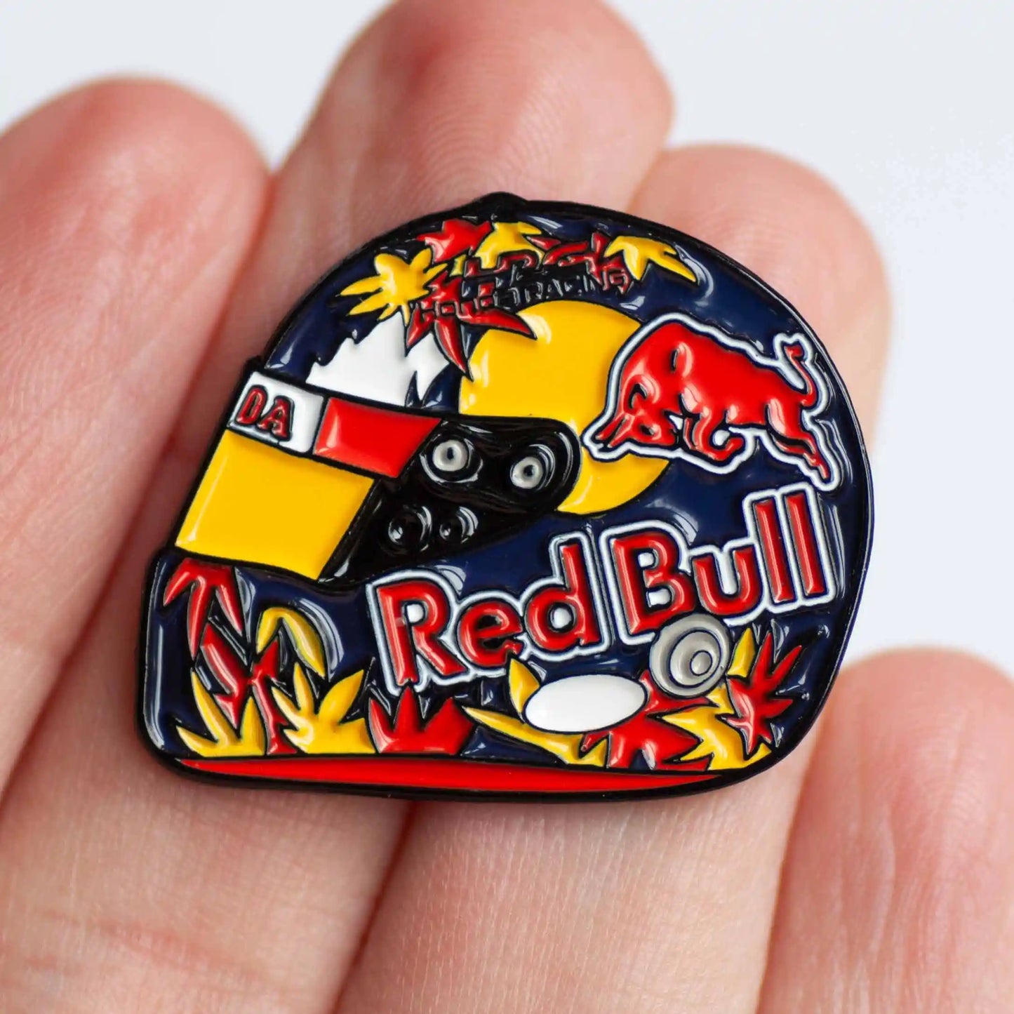 Yuki Tsunoda 2024 Helmet Enamel Pin Badge shown on hand