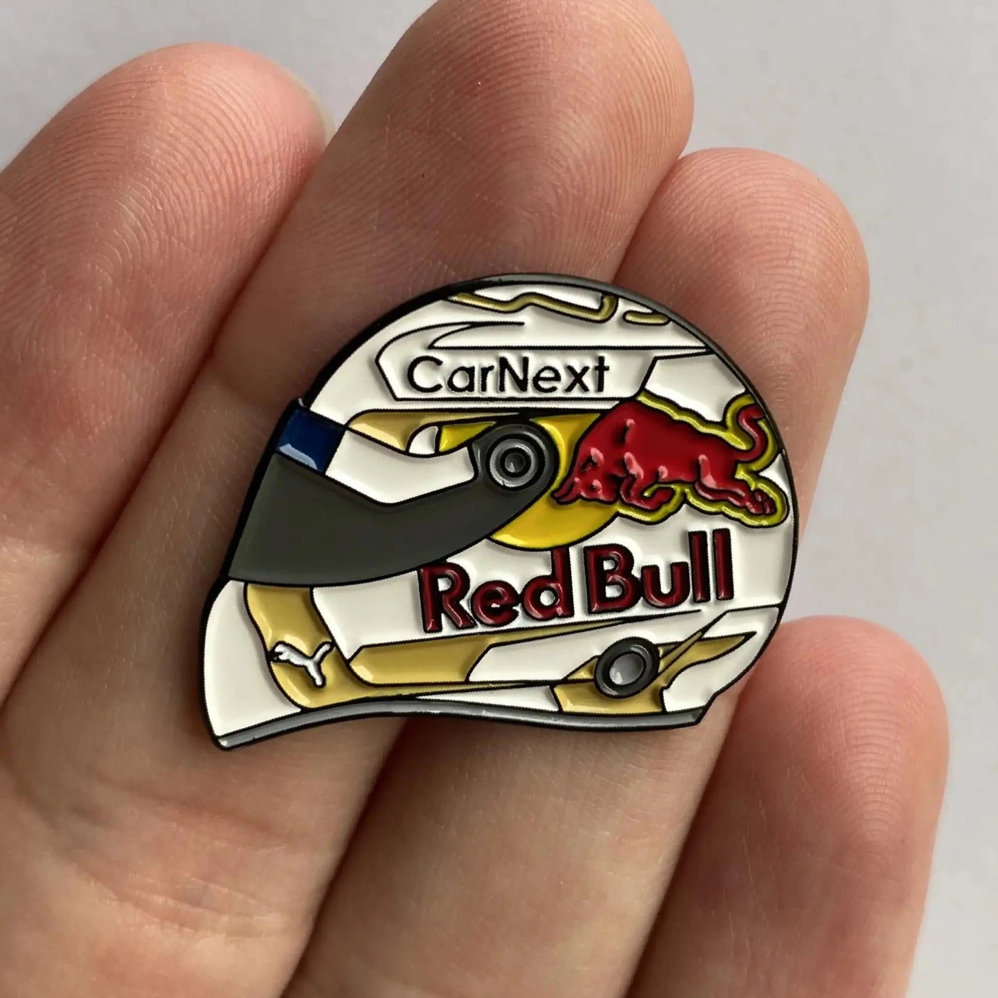 Max Verstappen 2022 Helmet Enamel Pin in hand