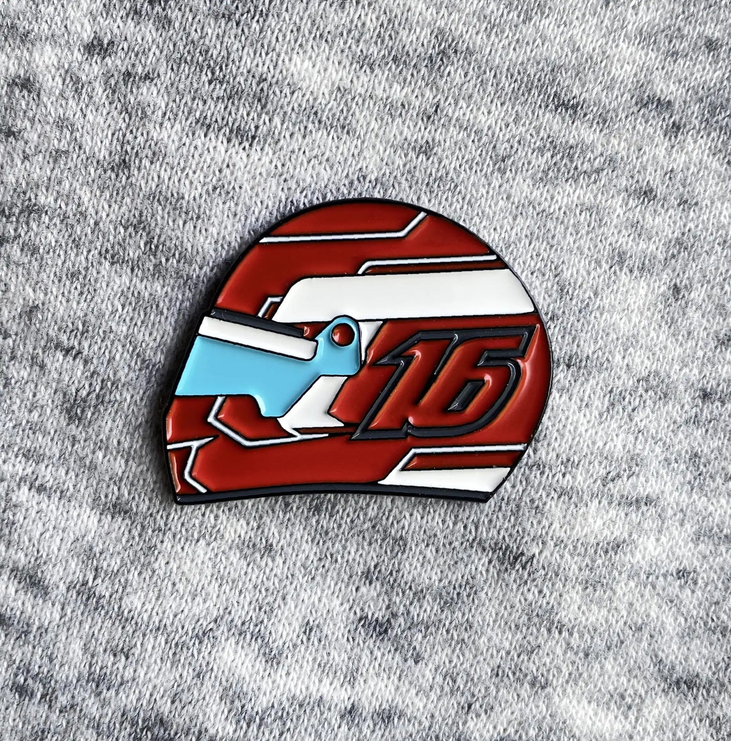 Charles Leclerc 2022 Helmet Enamel Pin on gray cloth
