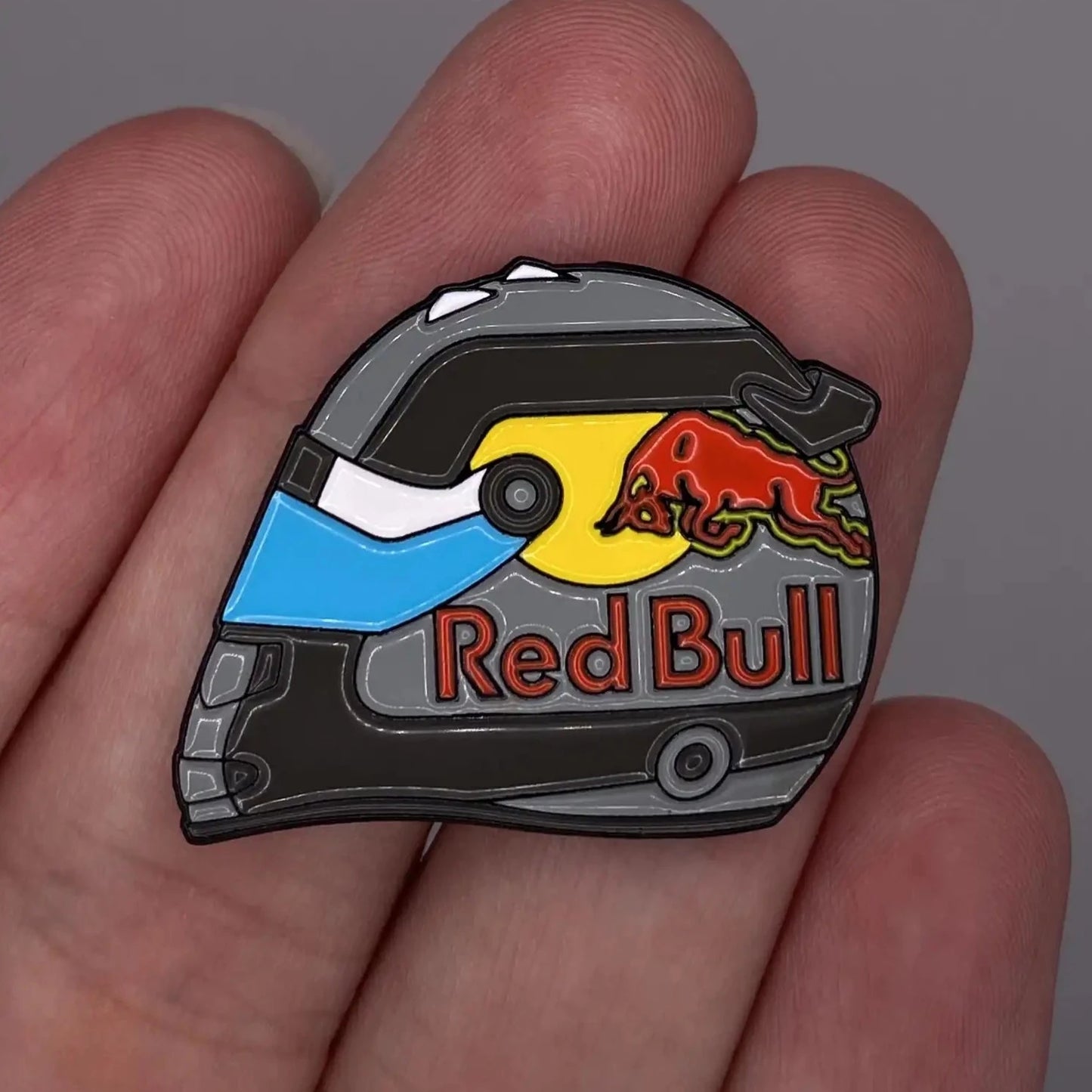 Sergio Perez 2022 Monaco Special Edition Helmet Enamel Pin shown on hand