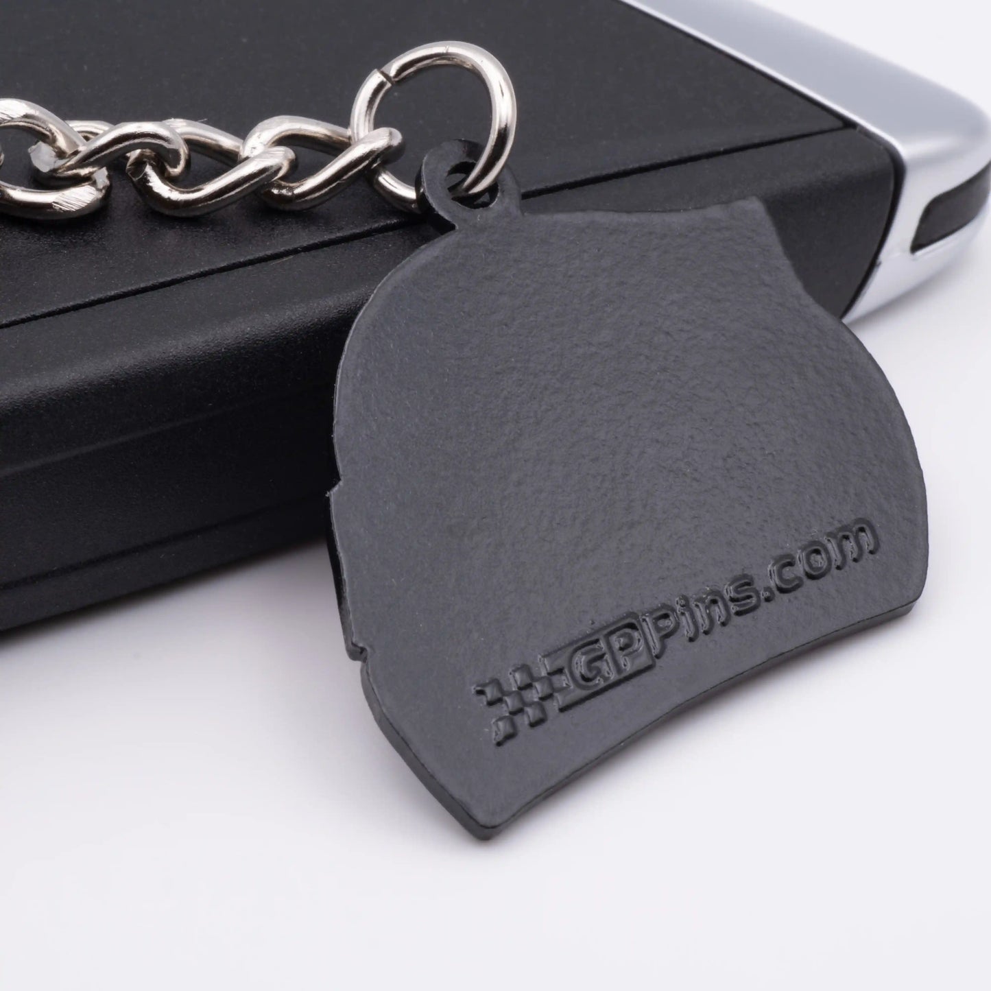 Back of Charles Leclerc 2025 Helmet Enamel Keychain