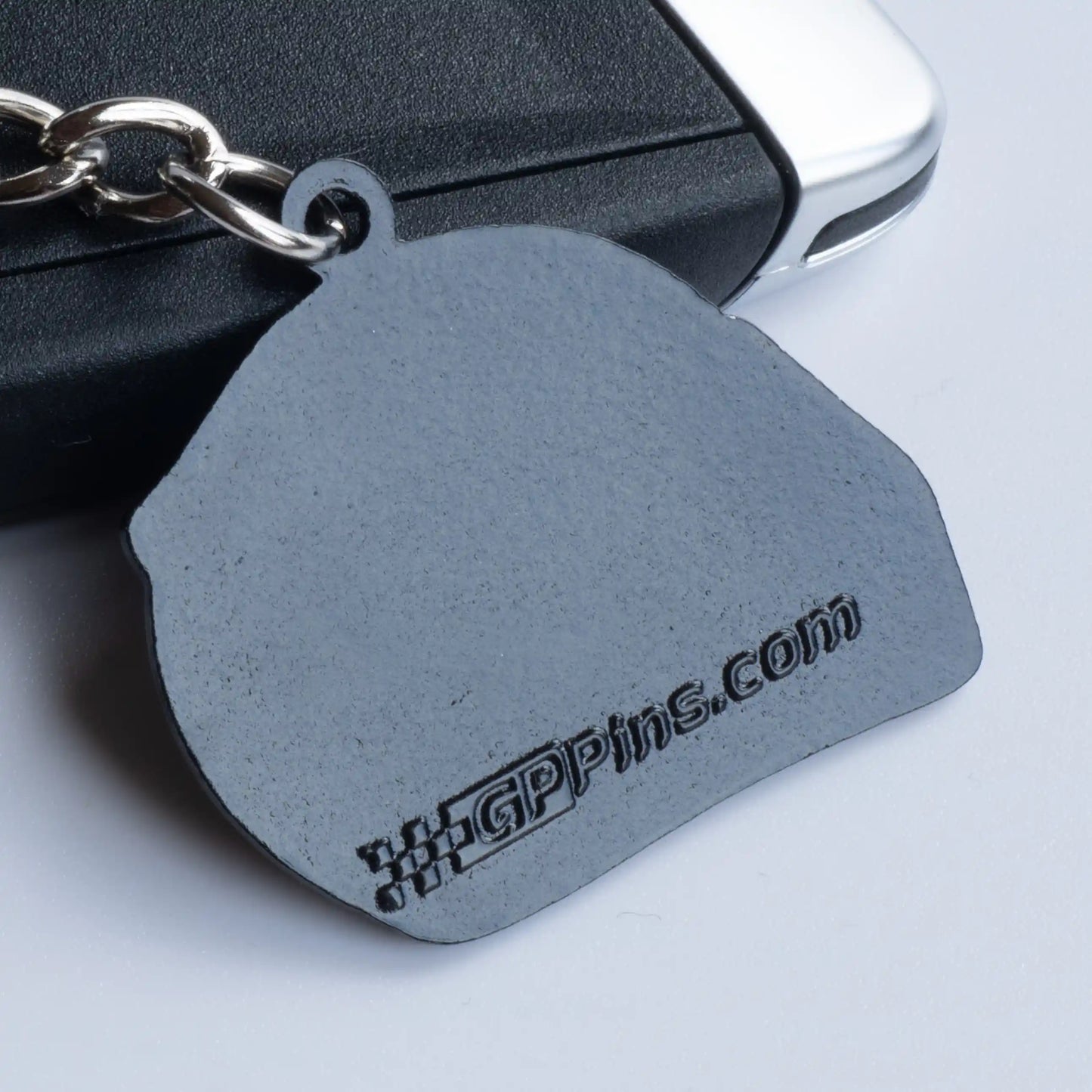 Back of Oscar Piastri 2025 Helmet Enamel Keychain