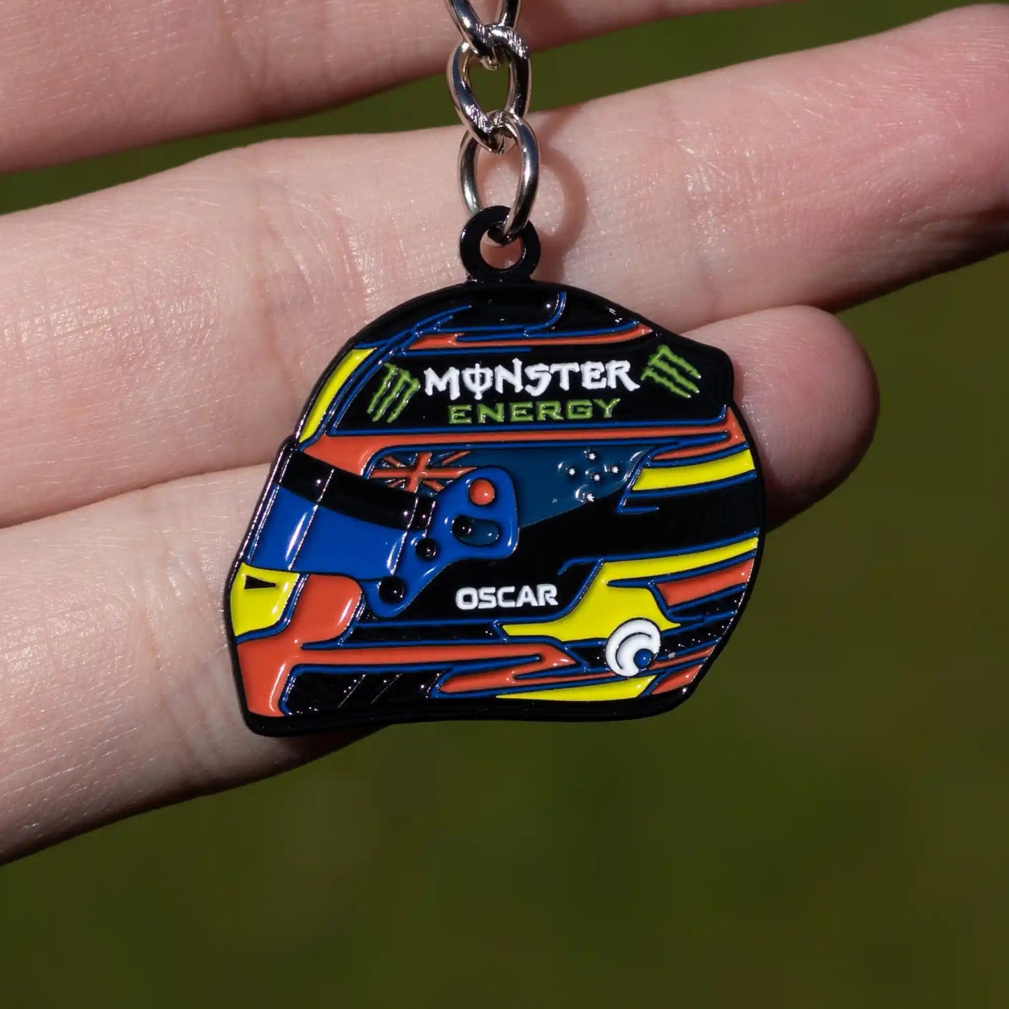 Oscar Piastri 2025 Helmet Enamel Keychain shown on hand