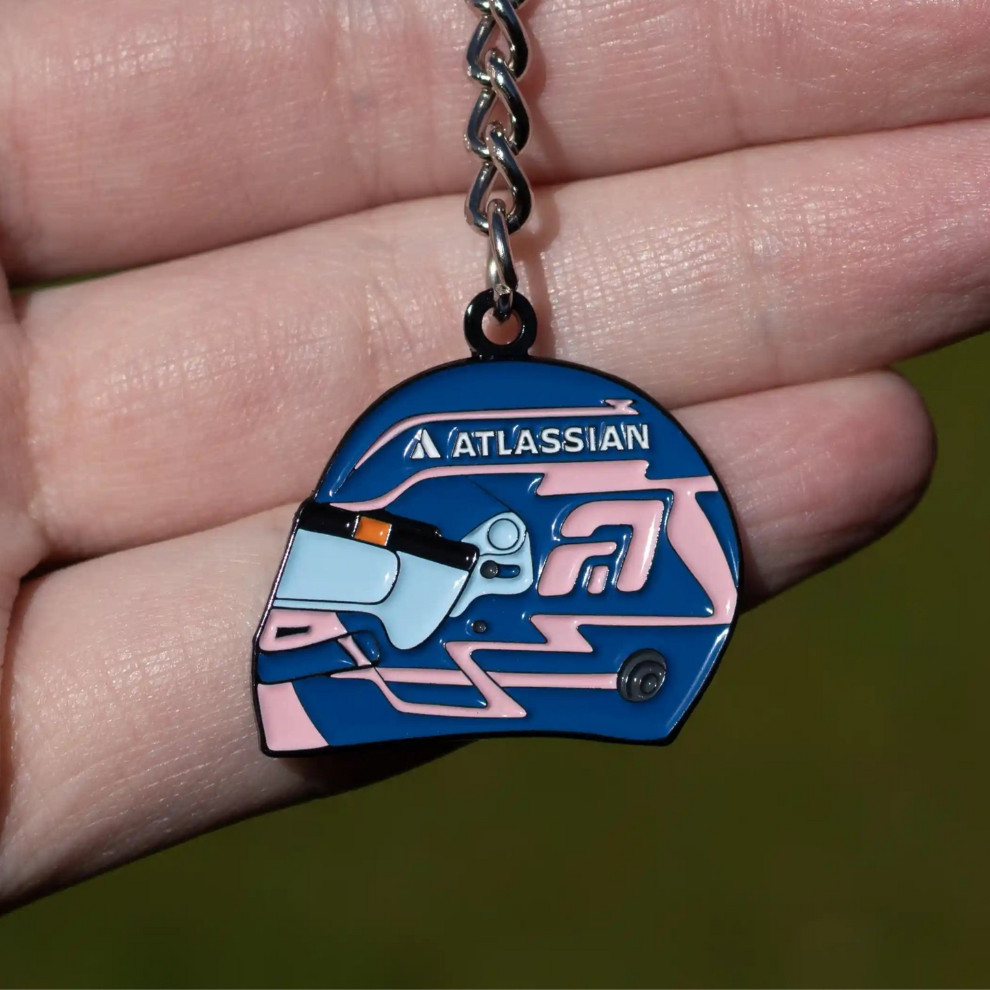 Alex Albon 2025 Helmet Enamel Keychain shown on hand