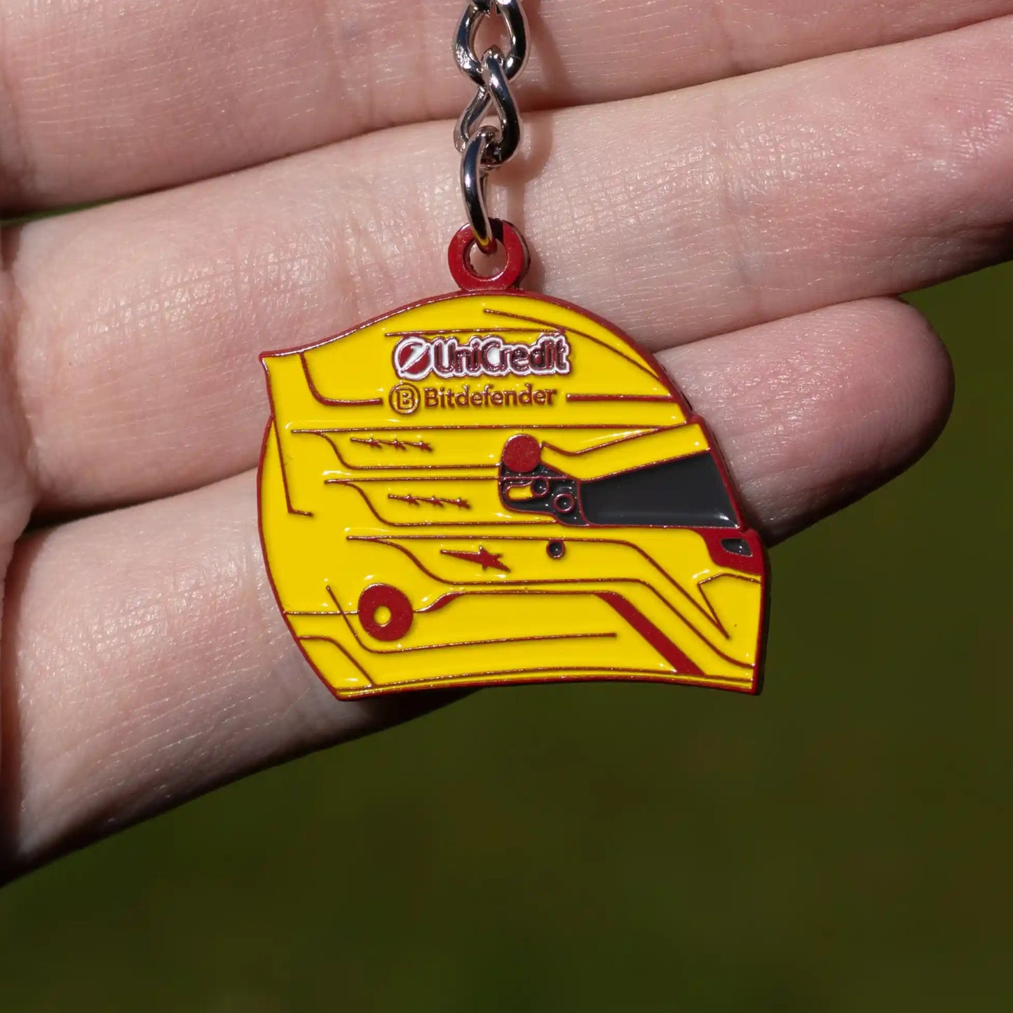Lewis Hamilton 2025 Helmet Enamel Keychain shown on hand