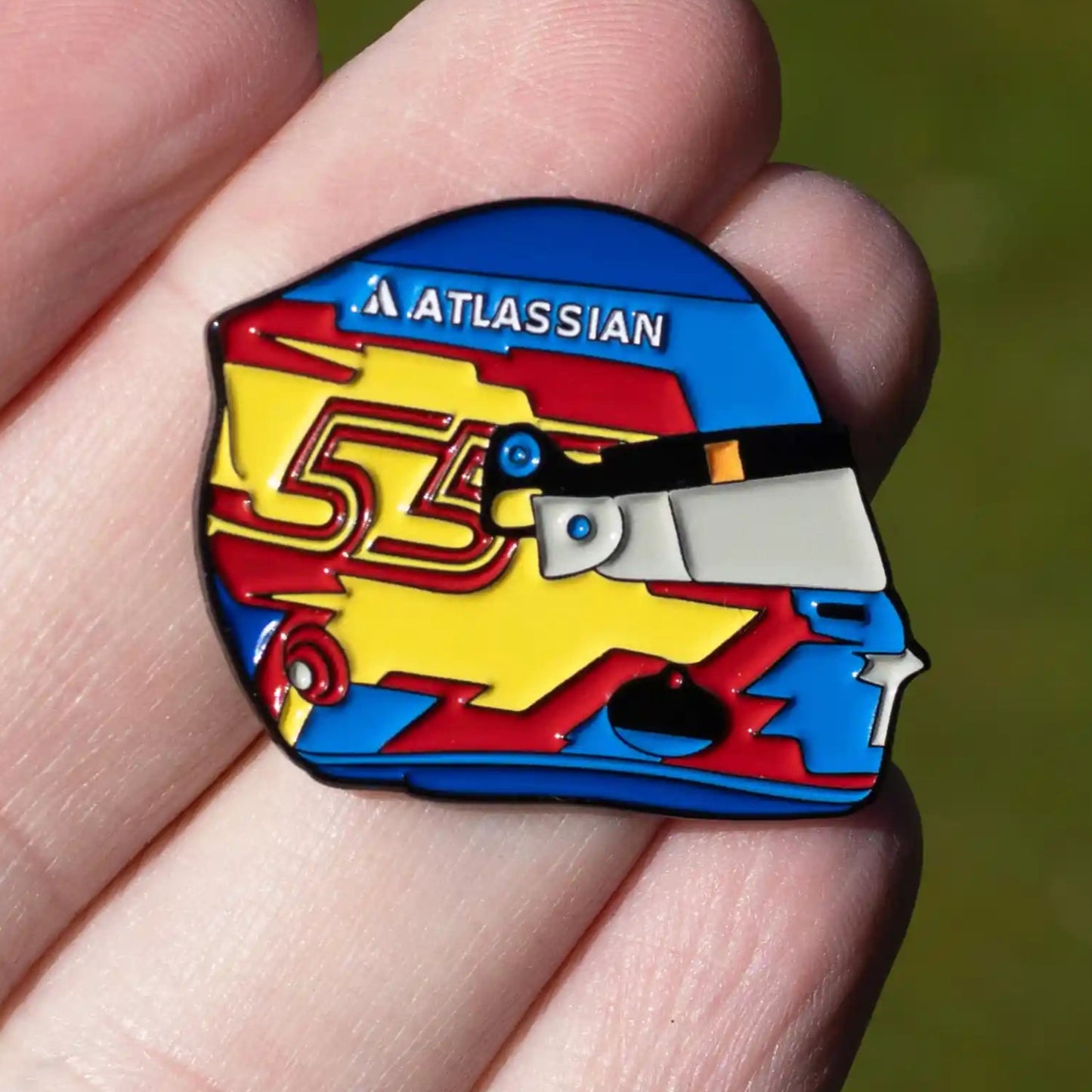 Carlos Sainz 2025 Helmet Enamel Pin shown on hand
