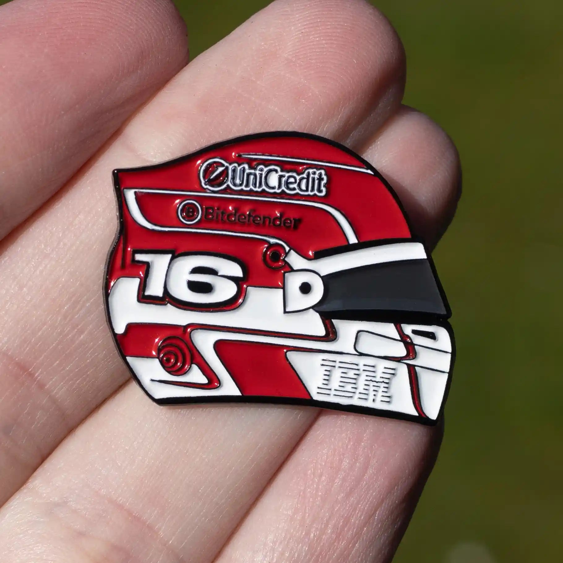 Charles Leclerc 2025 Helmet Enamel Pin shown on hand
