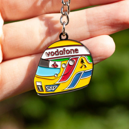 Lewis Hamilton 2008 Helmet Enamel Keychain shown on hand