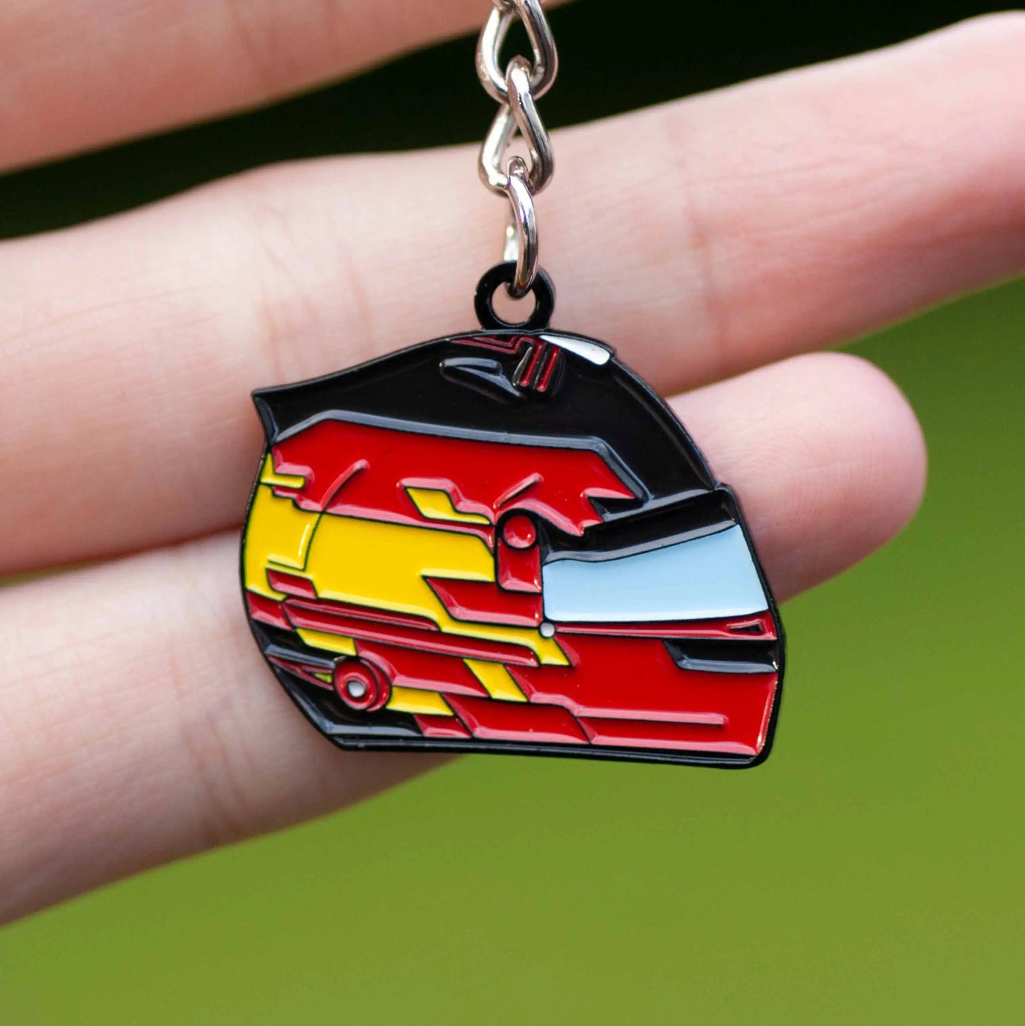Carlos Sainz 2024 Helmet Enamel Keychain shown on hand
