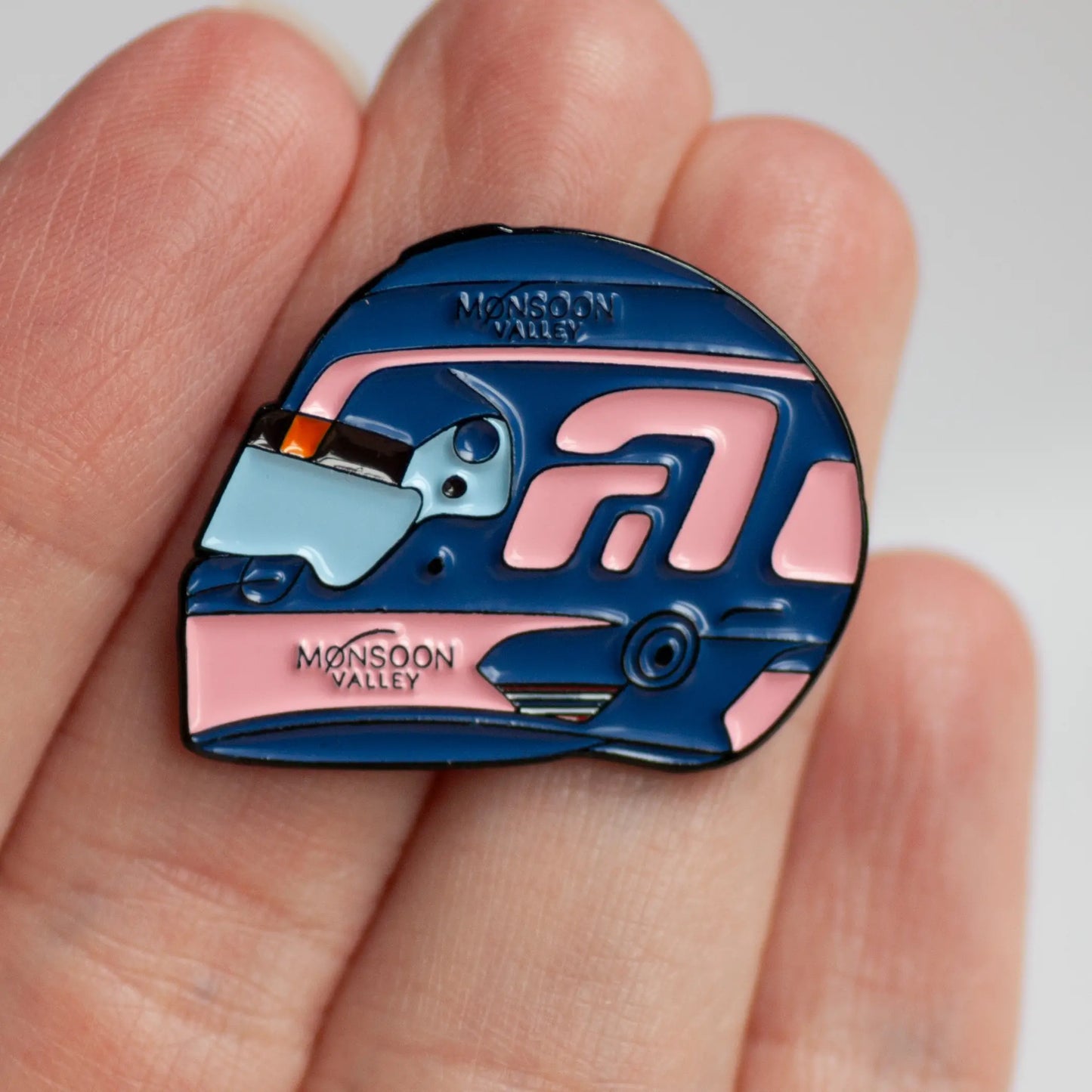 Alex Albon 2024 Helmet Enamel Pin shown on hand