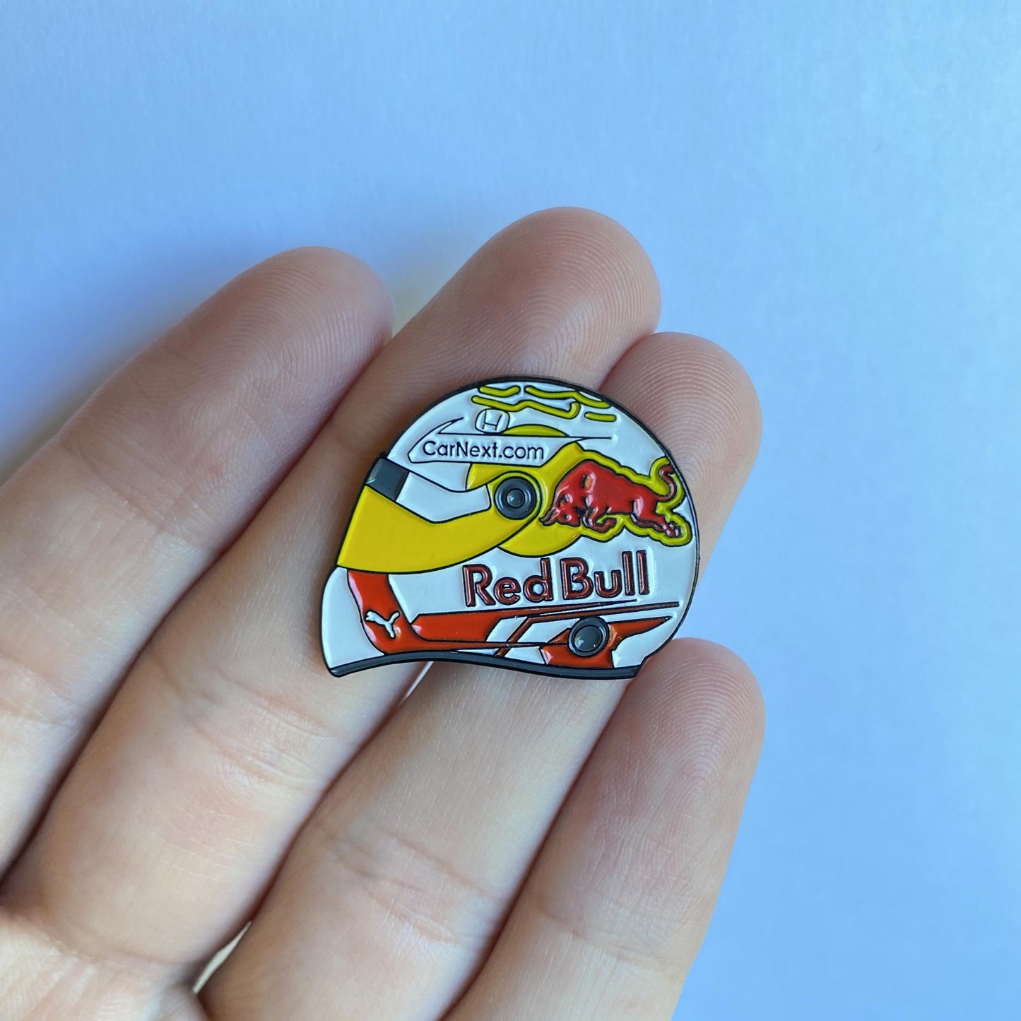 Max Verstappen 2021 Helmet Enamel Pin shown on hand