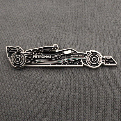 Mercedes W14 Formula One Car Enamel Pin shown on clothes