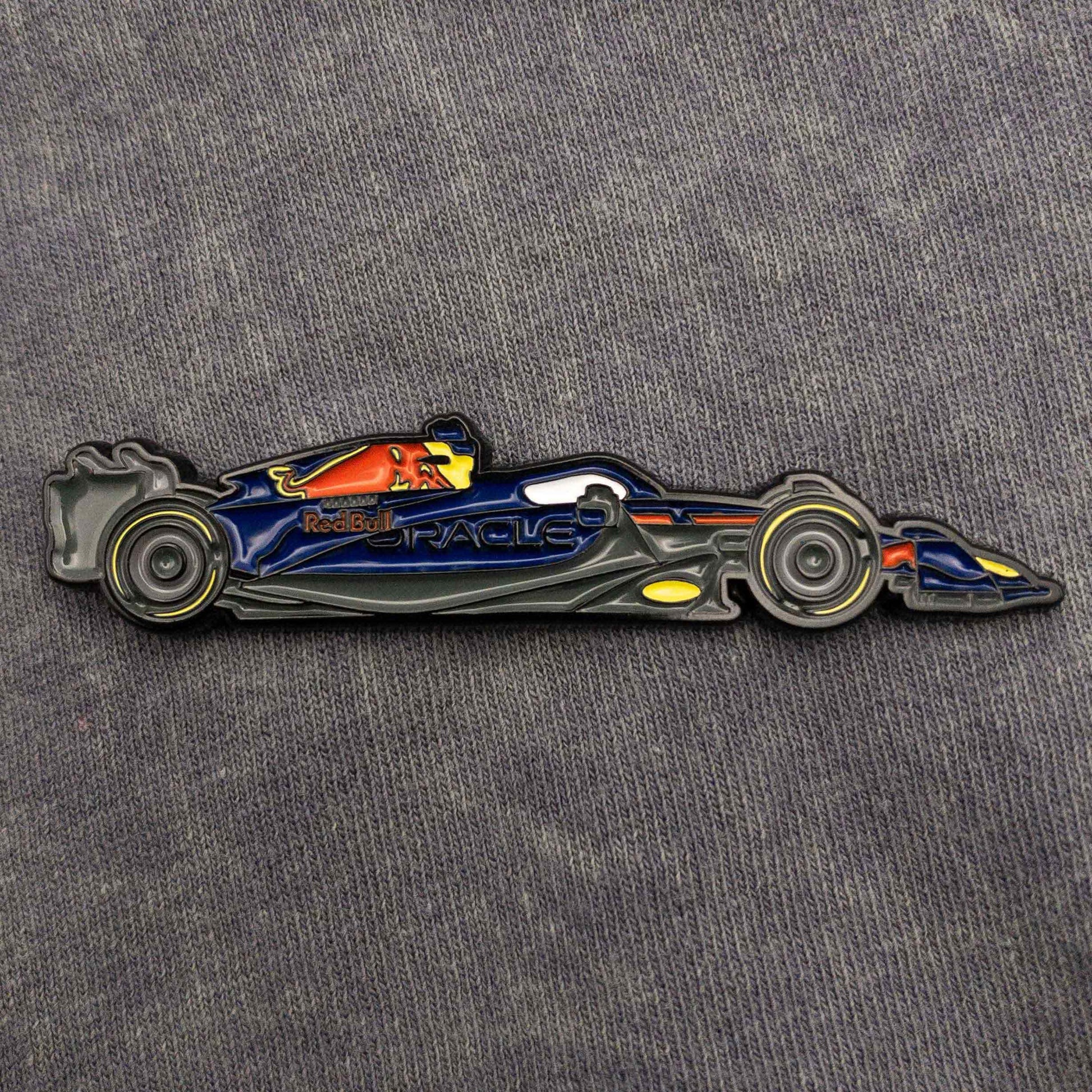 Red Bull RB19 Formula One Car Enamel Pin shown on clothes