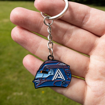 Alex Albon 2023 Helmet Enamel Keychain shown on hand