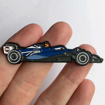 Williams FW45 800th GP Special Livery Enamel Pin shown on hand