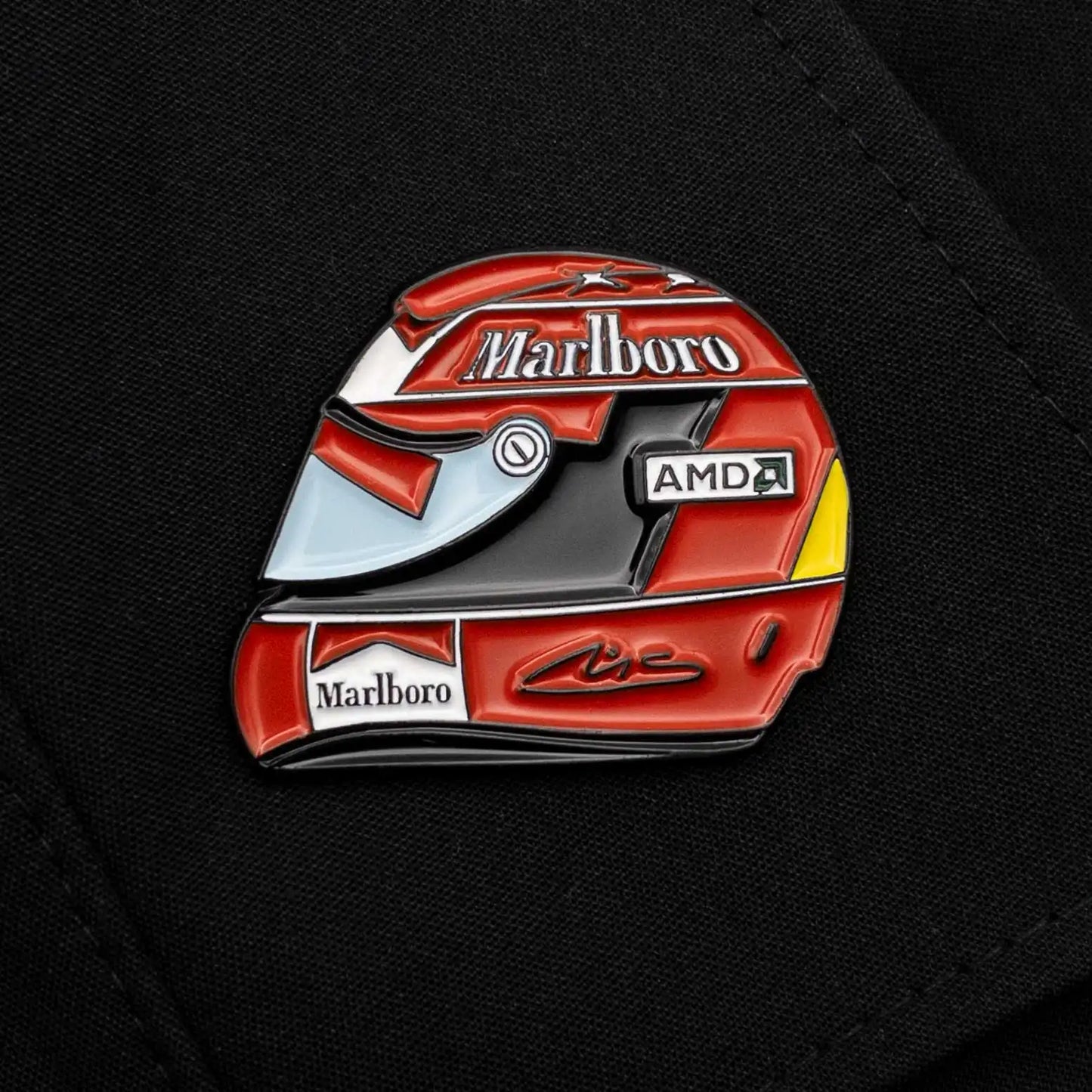 Michael Schumacher 2004 Helmet Enamel Pin shown on black clothes