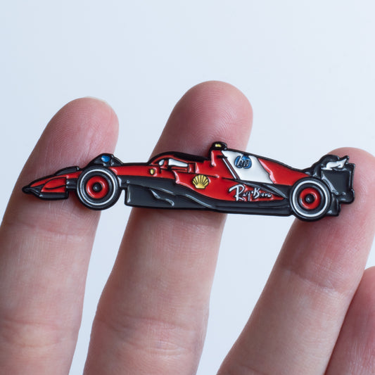 Ferrari SF-25 Formula One Car Enamel Pin shown on hand
