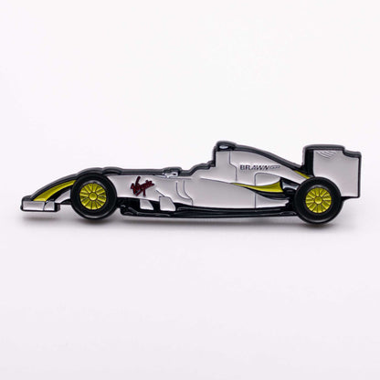 Brawn BGP 001 Formula One Car Enamel Pin shown on white background