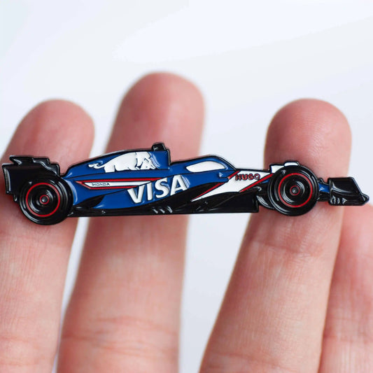 RB VCARB 01 Formula One Car Enamel Pin Badge shown on hand