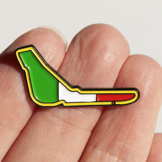 Monza Circuit Enamel Pin shown on hand