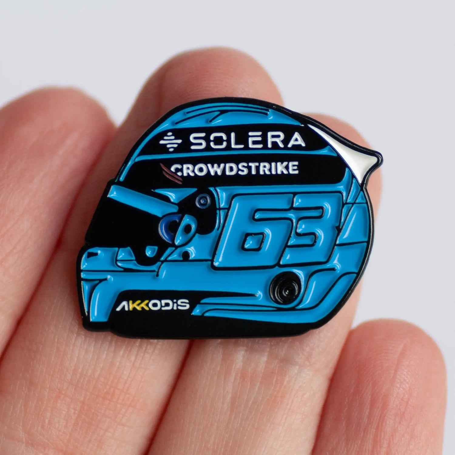 George Russell 2024 Helmet Enamel Pin shown on hand