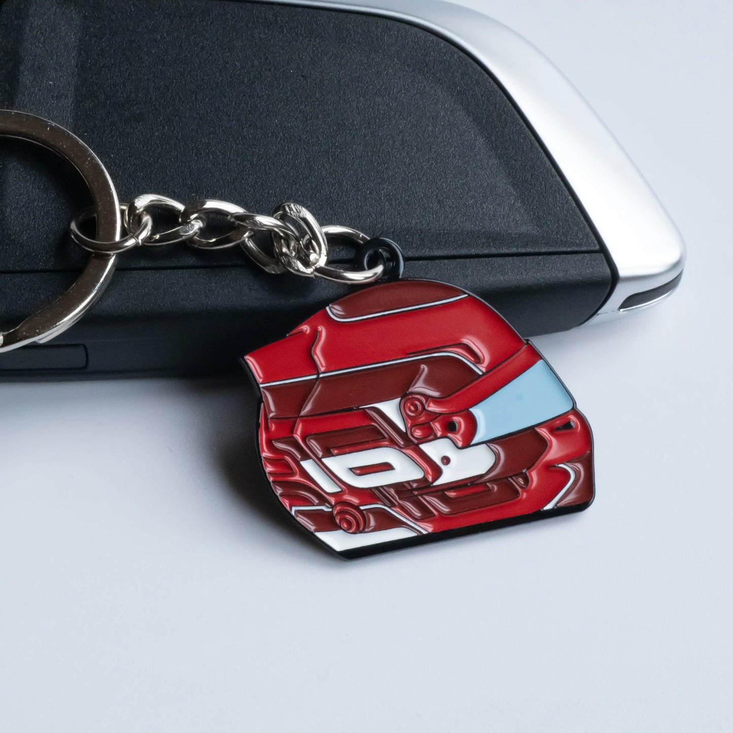 Charles Leclerc 2024 Helmet Enamel Keychain shown on key fob