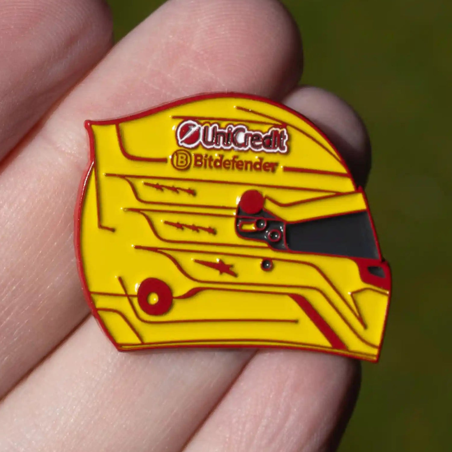 Lewis Hamilton 2025 Helmet Enamel Pin shown on hand