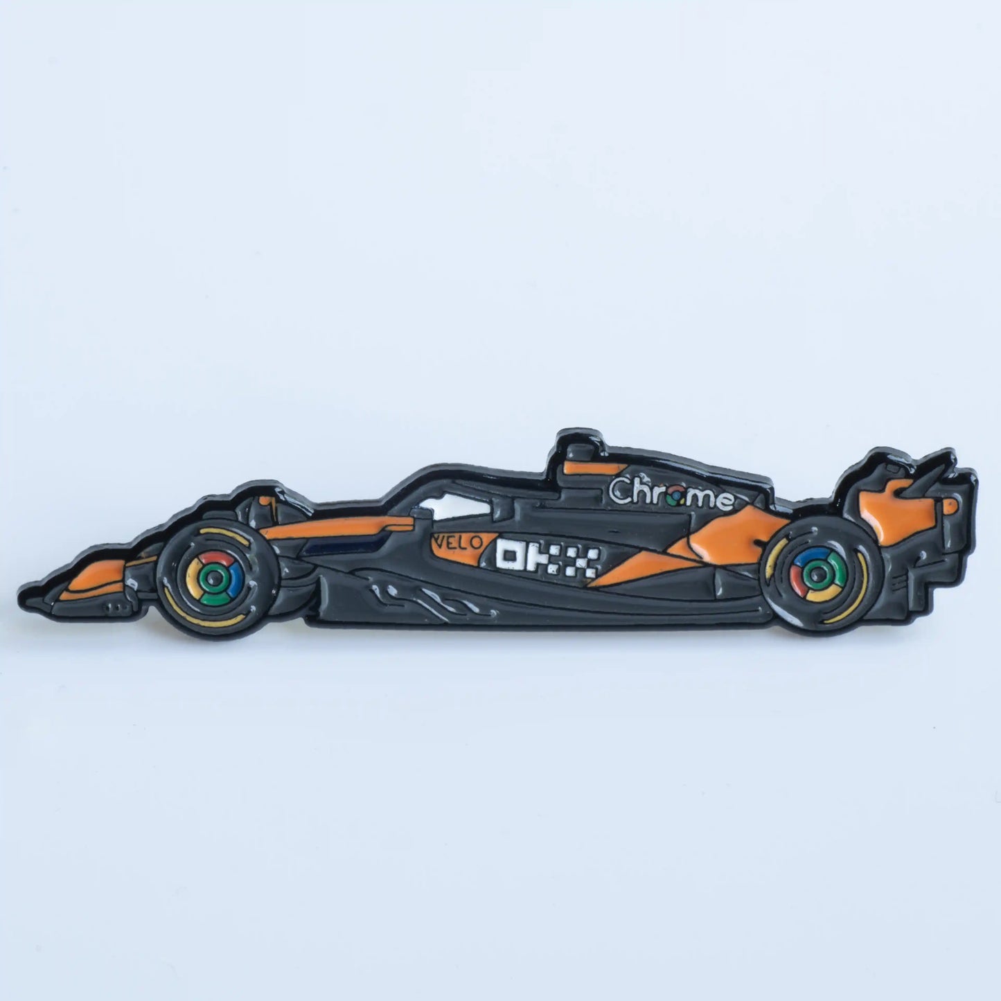 McLaren MCL39 Formula One Car Enamel Pin shown on white background