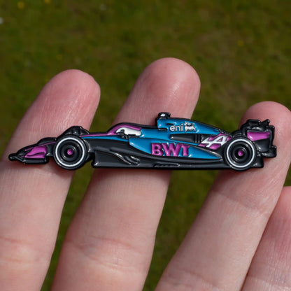 Alpine A525 Formula One Car Enamel Pin shown on hand