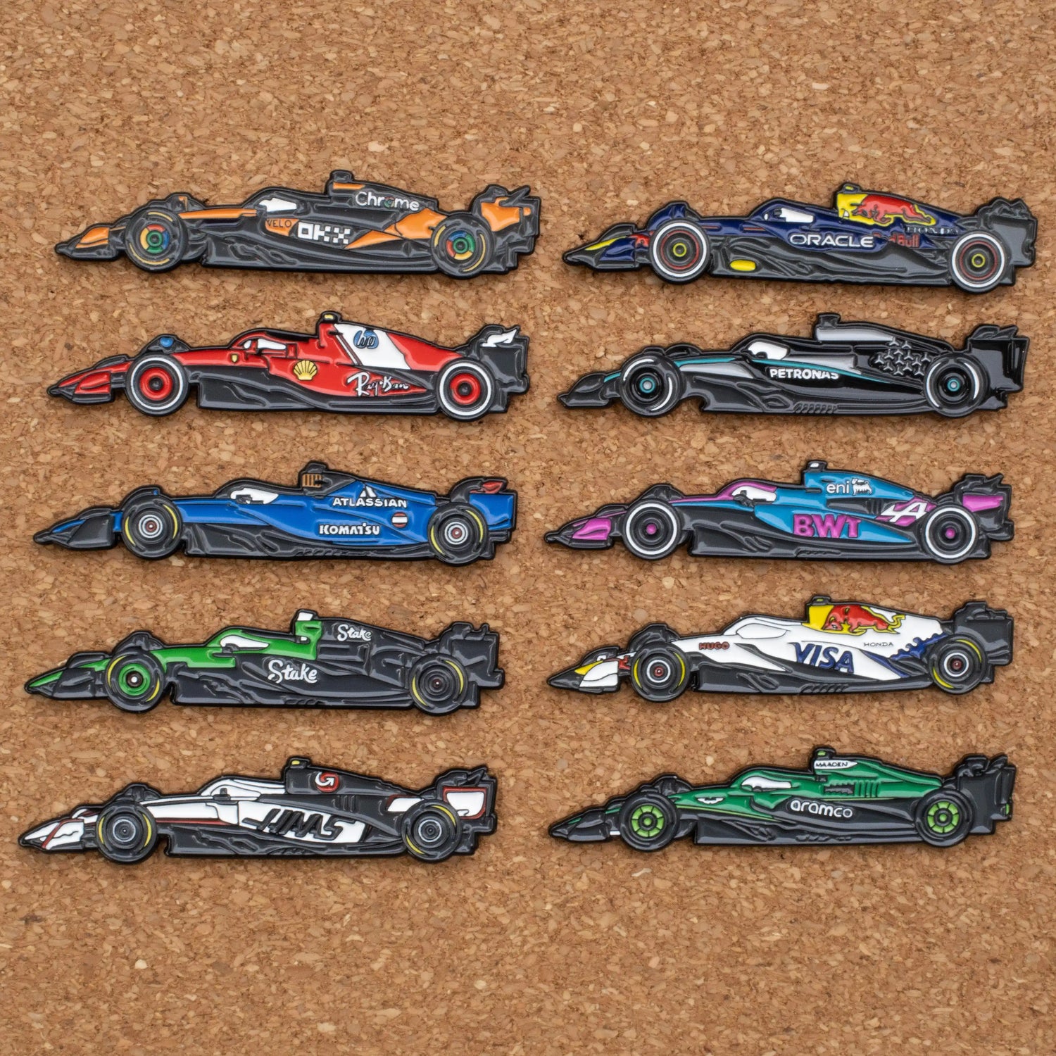 2025 F1 Car Enamel Pins Bundle, showing all ten 2025 F1 cars on a pin board 