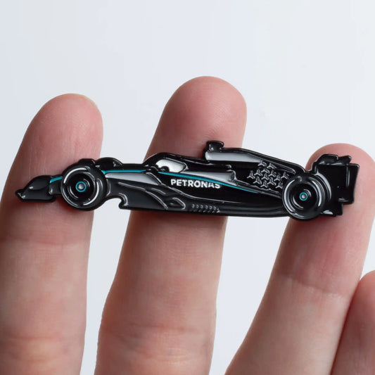 Mercedes W16 Formula One Car Enamel Pin shown on hand