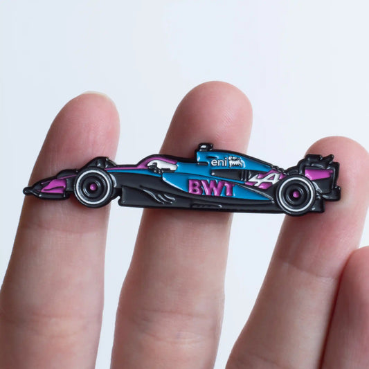 Alpine A525 Formula One Car Enamel Pin shown on hand