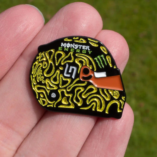 Lando Norris 2025 Inverted Glitter Helmet Enamel Pin shown on hand