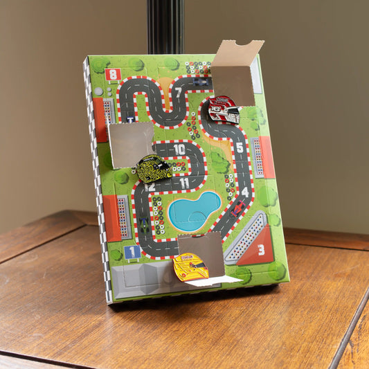 F1 Enamel Pin 12 Door Advent Calendar front showing some pins in the doors