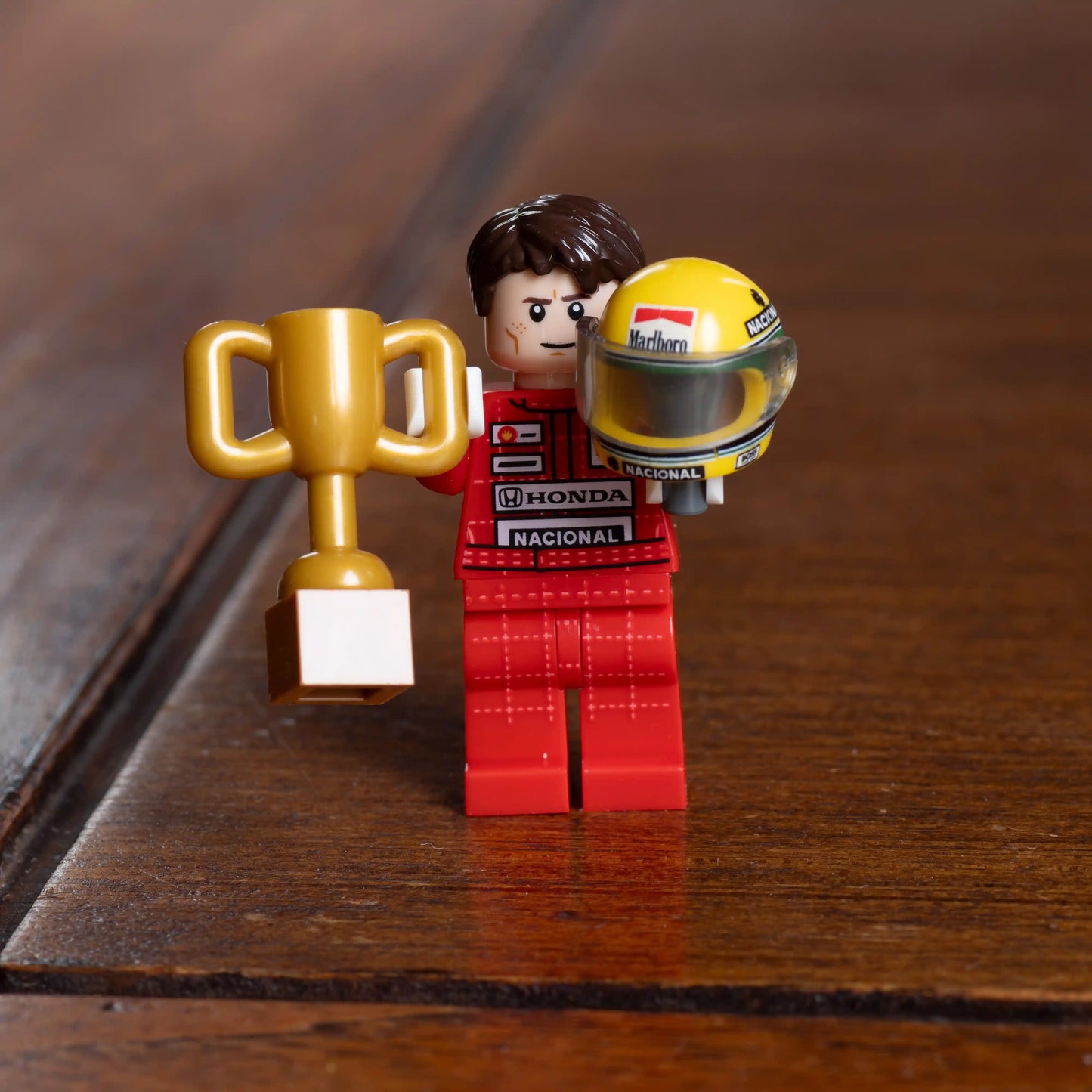 Ayrton Senna Custom Lego Minifig Helmet shown with Senna minifig