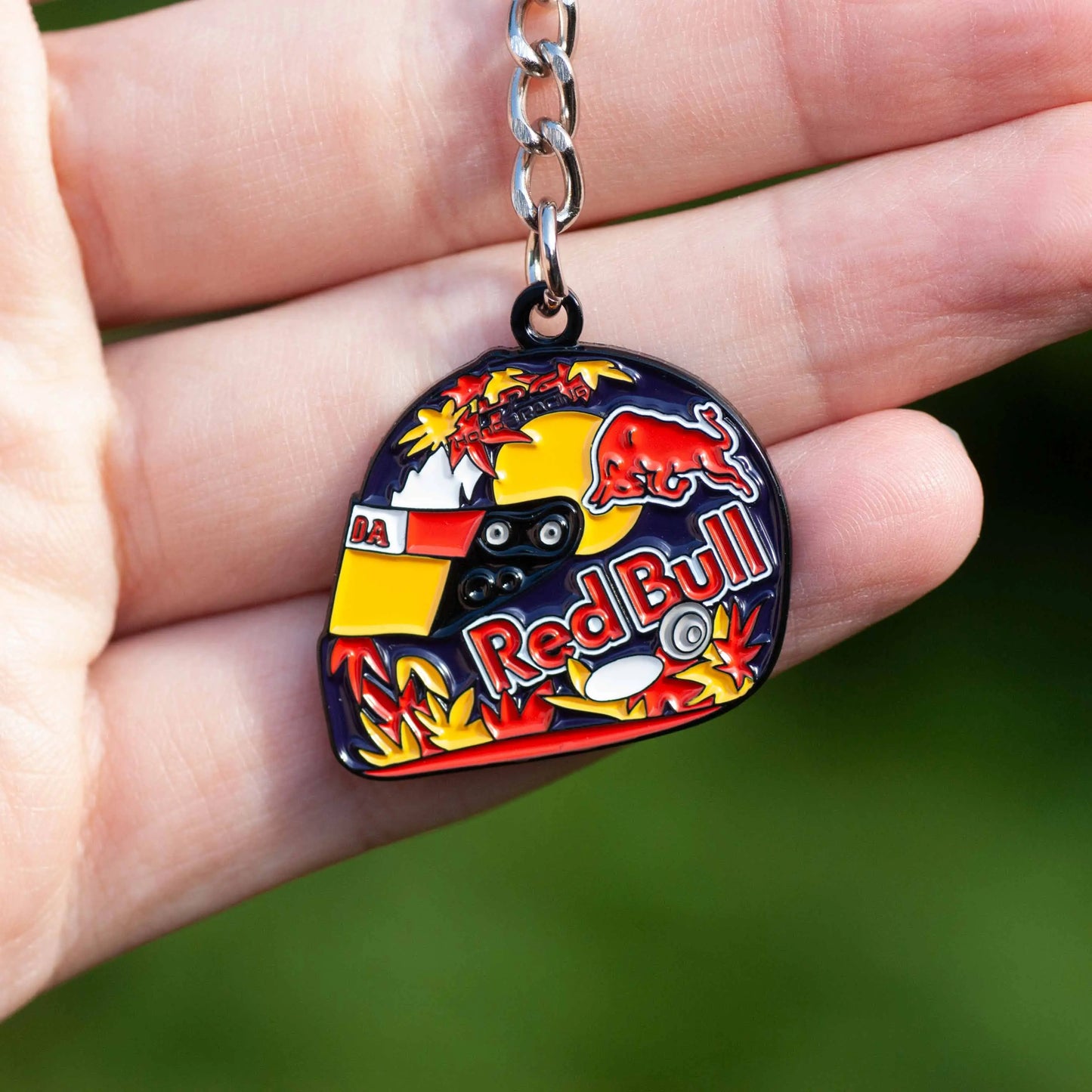 Yuki Tsunoda 2024 Helmet Enamel keychain shown on hand