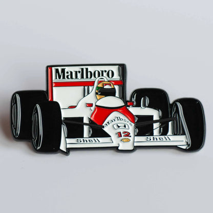 Ayrton Senna's MP4/4 Formula One Car Enamel Pin shown on white background