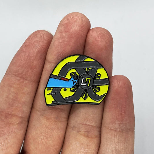 Lando Norris 2021 Helmet Enamel Pin shown on hand